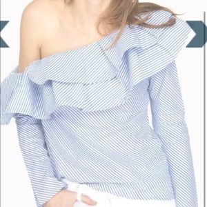 Dramatic, one shoulder ruffle top. Perfect for spring and summer.